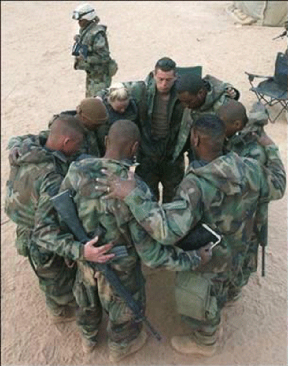iraq-soldierspraying Source: Alternet