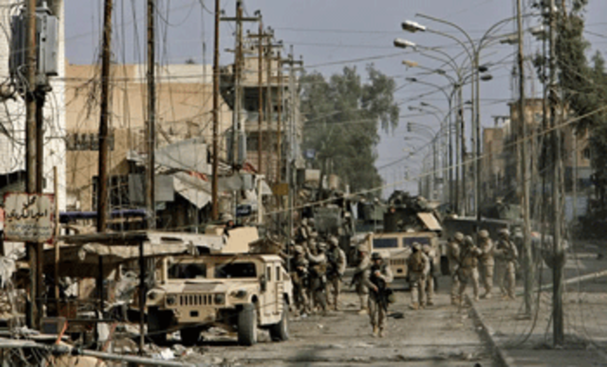 battle march photo battle march Dahlia Wasfi and the Tragedy of Iraq