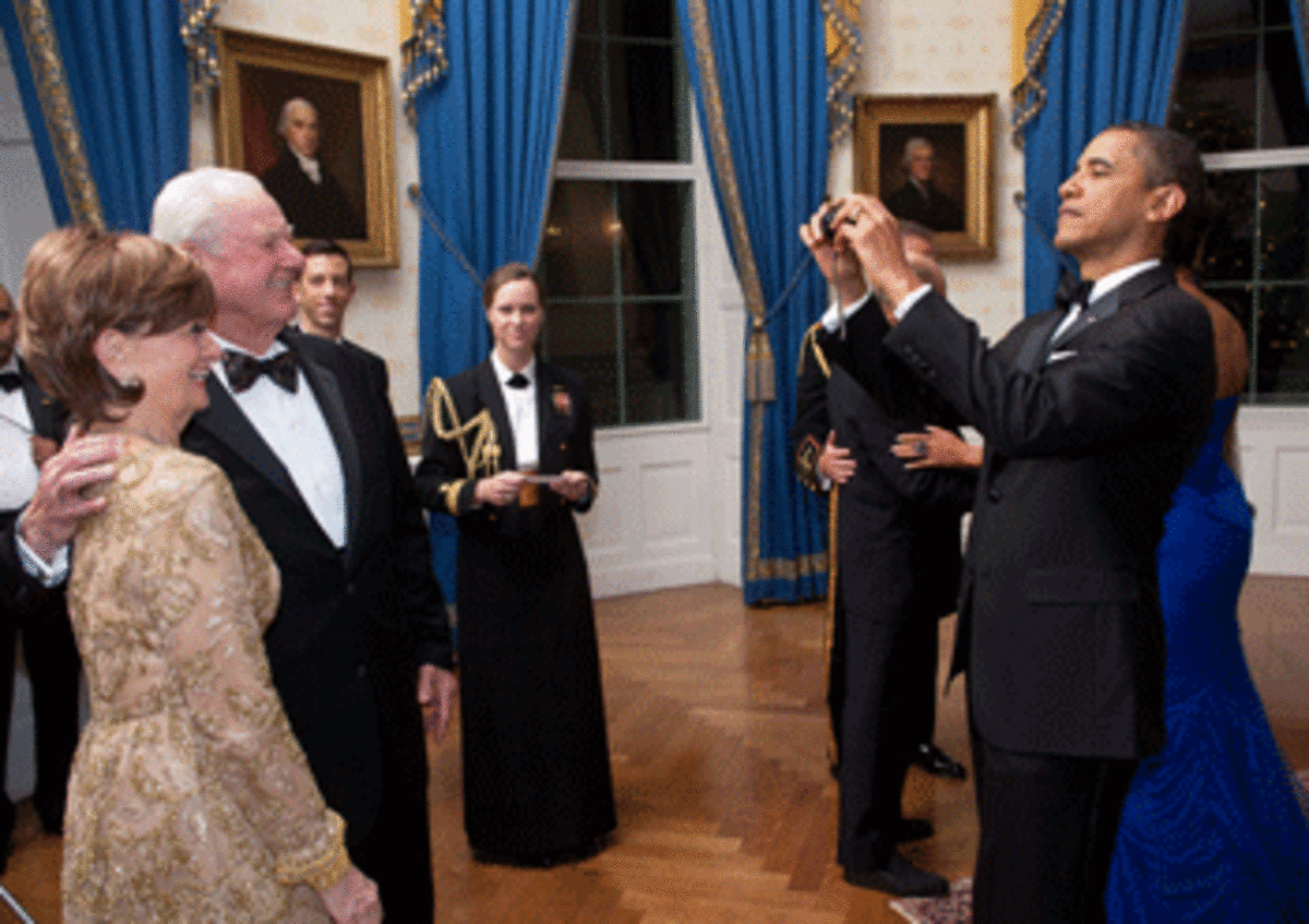 obama taking a picture