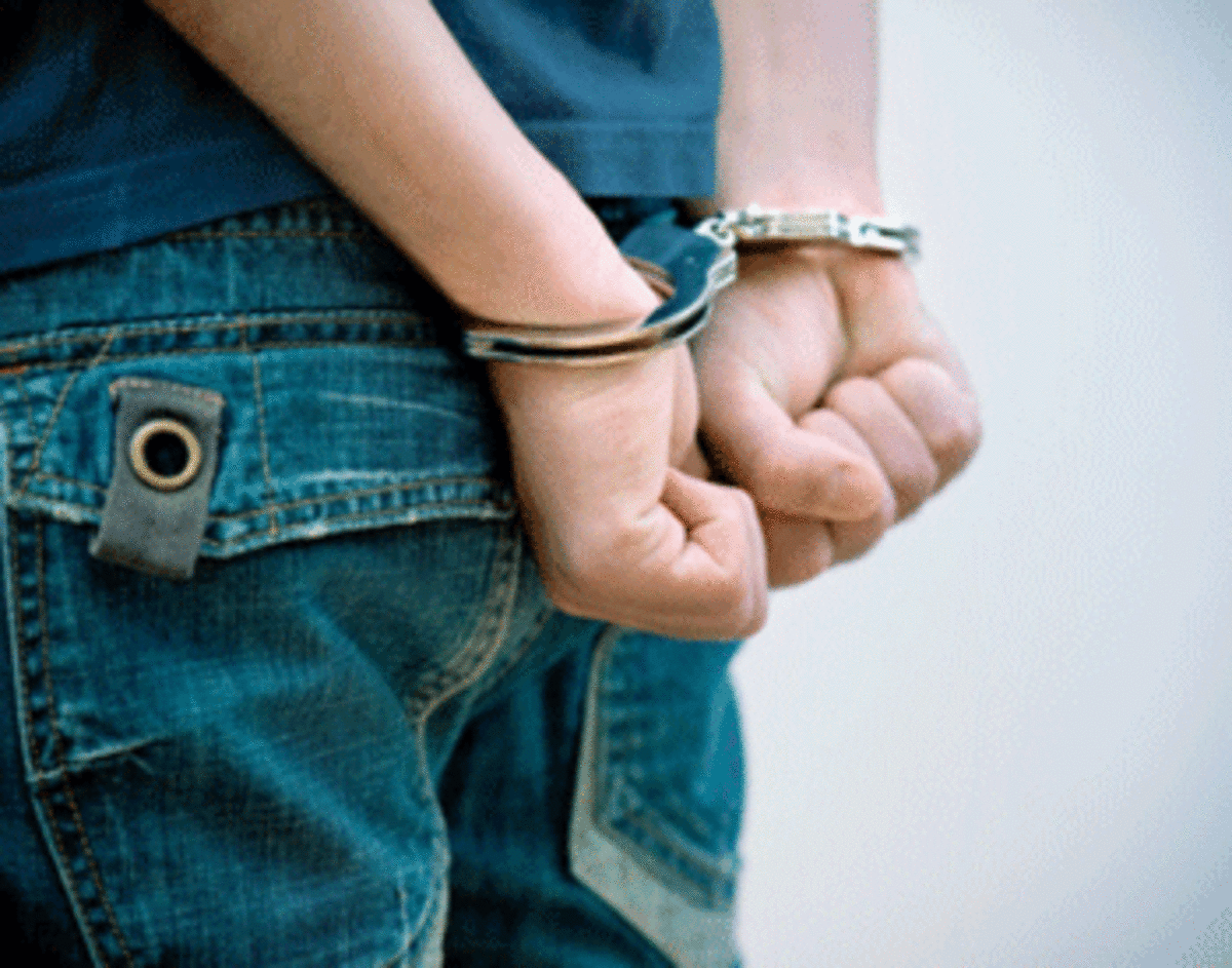 handcuffed California TRUST Act Awaits Governor’s Signature