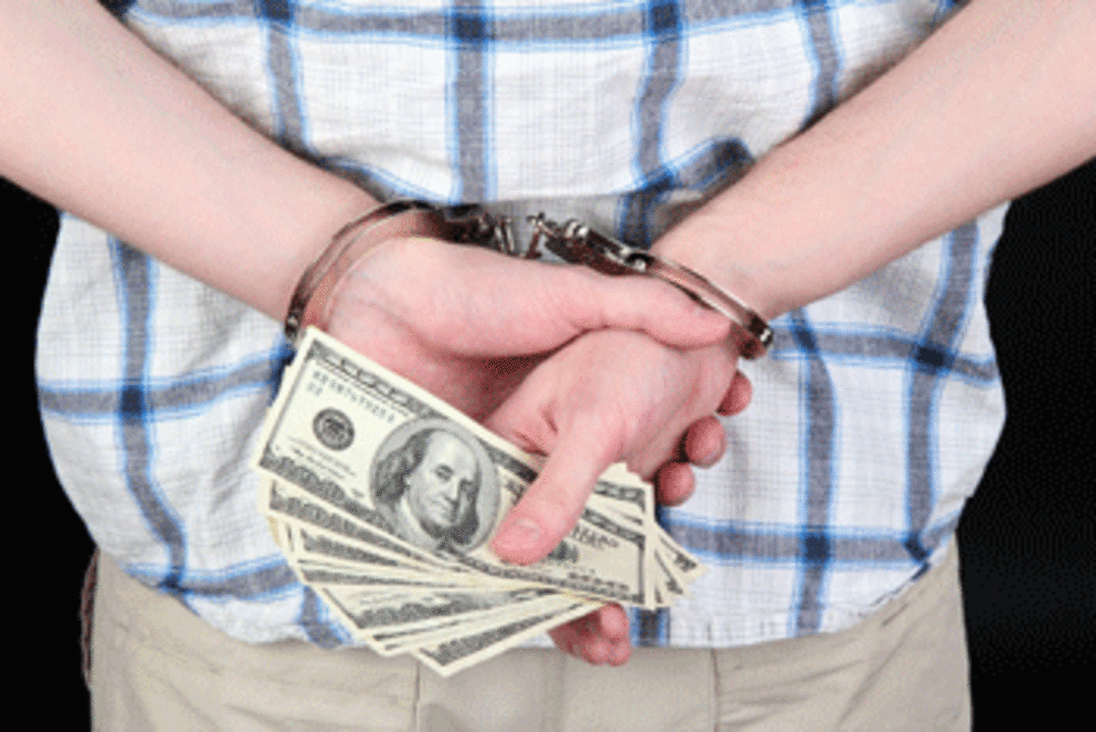handcuffs and money Immigrant Detention and the Private Prison Industry