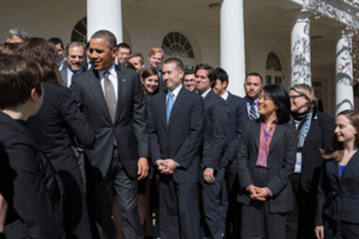 President Barack Obama greets staff of Council of Economic Advisers (Official White House Photo by Pete Souza) Jobs Needed Now