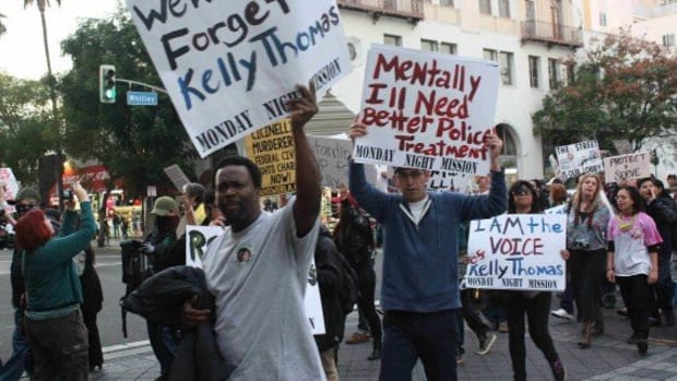 Demonstrators march in Hollywood on Feb.8 to demand justice for Kelly Thomas, a mentally-ill homeless man who was brutally beaten by Fullerton police. Thomas died five days later and the officers responsible for the beating were acquitted of second-degree murder and lesser charges