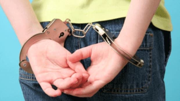 handcuffed-immigrant