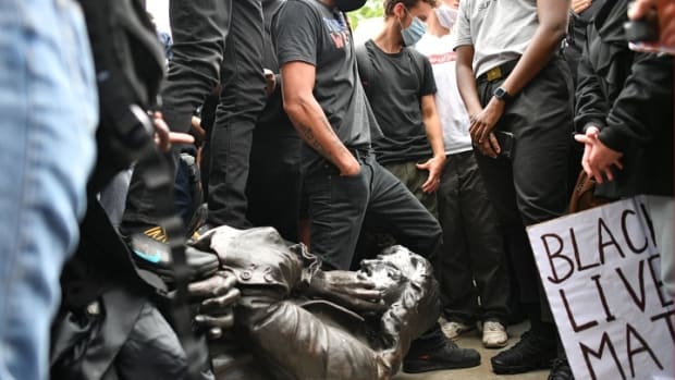 Protesters with the statue of Edward Colston in Bristol, 7 June 2020. Photograph: Ben Birchall/PA
