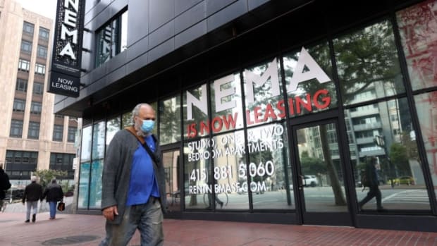 SAN FRANCISCO, CALIFORNIA - SEPTEMBER 01: A pedestrian walks by a building advertising apartment leases on September 01, 2020 in San Francisco, California. San Francisco rental prices have dropped nearly 15 percent in the past year as residents begin moving away from the city. (Photo by Justin Sullivan/Getty Images)