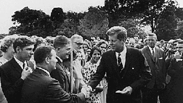 President John F. Kennedy urging University of Michigan students to support and join the Peace Corp in 1960.