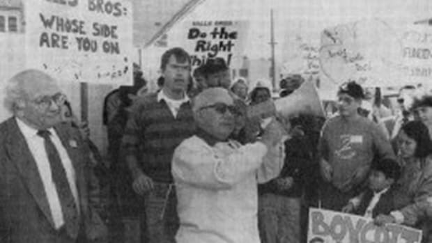 Fred Ross Jr with ILWU leader Jimmy Herman and HERE organizer Tho Do at Neighbor to Neighbor coffee protest in the 1980s