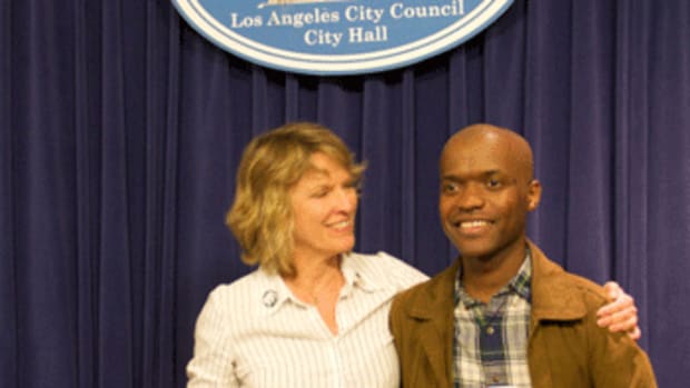 Move to Amend LA co-chairs Mary Beth Fielder and Daniel Lee savor their victory at the press conference afterwards.