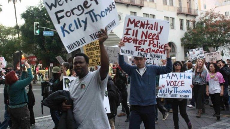 Police Behavior Focus of Demonstration Supporting Justice for Kelly Thomas