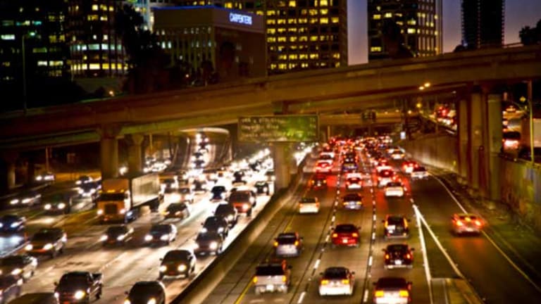 More Money, Less Carbon