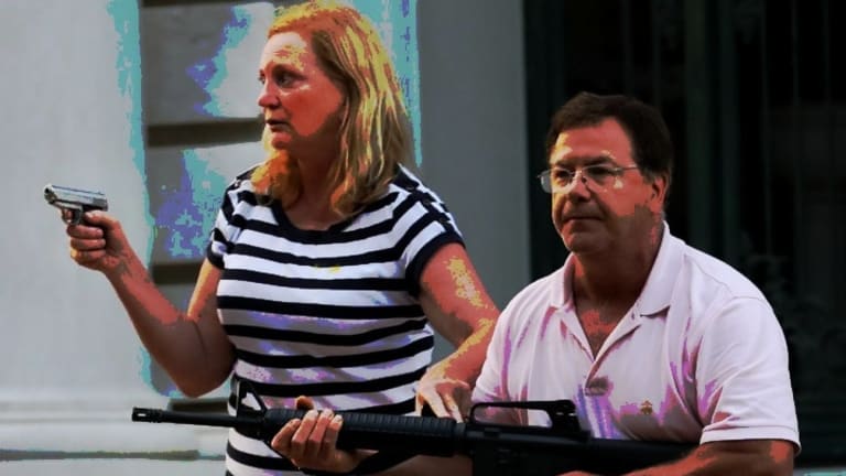 Wielding an AR-15 at Black Organizers