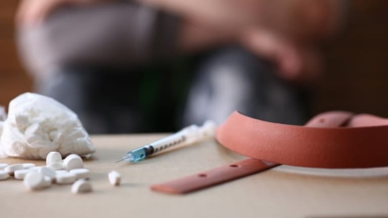 A 12-Step Program to Opioid Justice