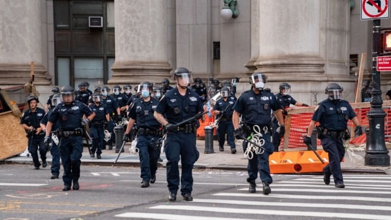 Demonstrators Sue Police