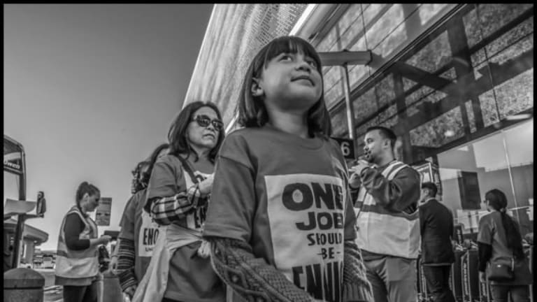 Barred from Striking, Airline Food Workers Sit Down in Traffic