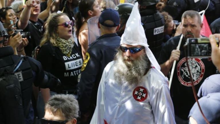 The Klan's Media Spotlight: Exposing or Elevating?