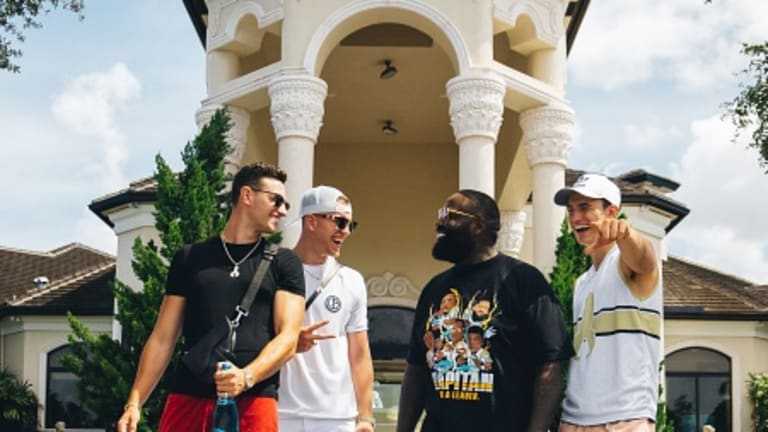 HighKey Clout and Hip-Hop Icon Rick Ross Give Away a Tesla