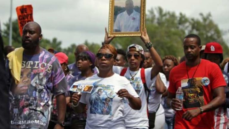 Over 1,000 Protest In Ferguson, Call For Highway Shutdown Monday