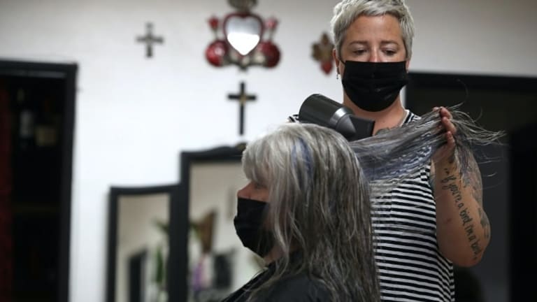 Cutting It Close: Hair Stylists Worry About Returning to Their Chairs