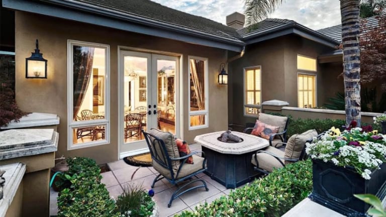 Living Room with Multiple Doors and Windows