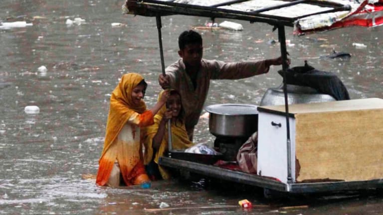 Paying for Overheating Earth