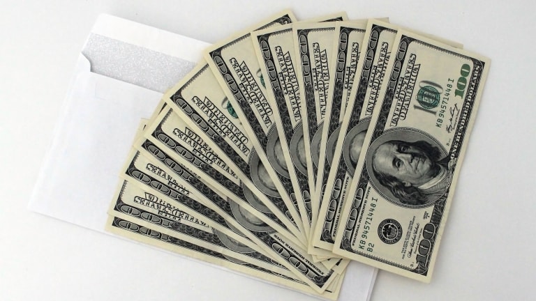 Fighting Money with Money to Make Elections Cleaner