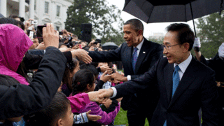 Obama’s Free Trade Agreement: Backdoor Deal with Corporate America?