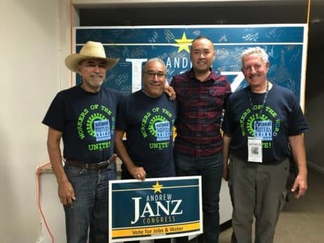 Andrew Janz, third from left, with members of the National Writers Union and People’s World correspondent Eric A. Gordon, right. | PW