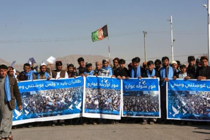 People's Peace Movement marchers in Kandahar on January 17th 2019, holding placards saying: 'No War', 'We want ceasefire' and 'We want Peace.' (Photo: AFP/Javed Tanveer)