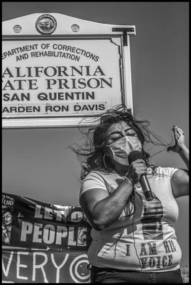 Laura Mondragon is the wife of a prisoner, and talked about the trauma of not knowing what was happening to him. Phone calls between prisoners and family members were cut off five days before the vigil.