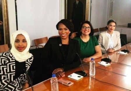 Ilhan Omar (D-MN), Ayanna Pressley (D-MA), Rashida Tlaib (D-MI), and Alexandria Ocasio-Cortez (D-NY)