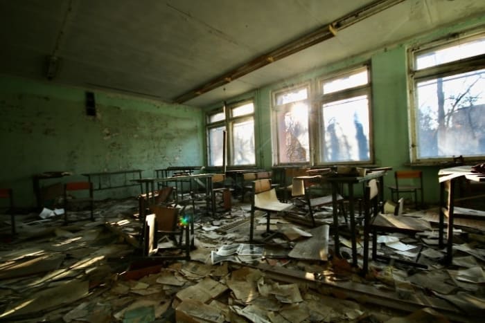 An abandoned classroom in the ghost town of Pripyat, located in the Chernobyl Exclusion Zone. Photo by Jorge Fernández Salas on Unsplash