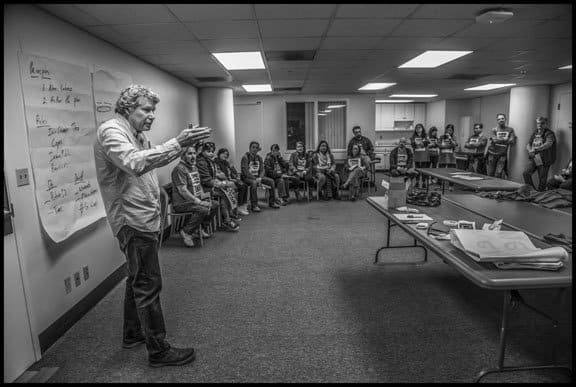 Kevin O'Connor, regional organizer for Local 2, goes over the plan for civil disobedience with workers and supporters.