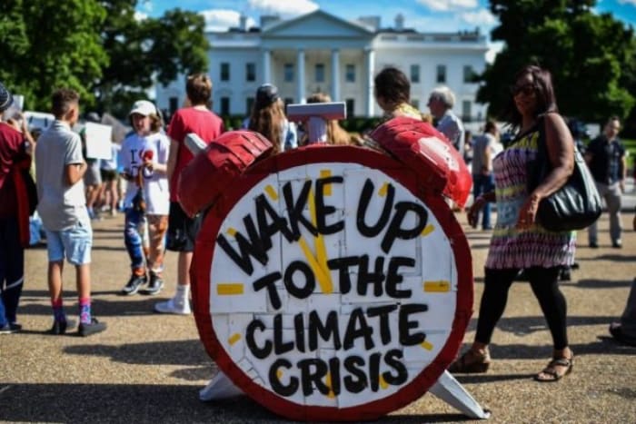 WASHINGTON, DC – JUNE 1: A replica of a clock is seen at Lafayette Square as people gathered to protest President Trump announcement that U.S. will pull out of the Paris climate agreement on Thursday, June 1, 2017 in Washington, D.C. (Photo by Salwan Georges/The Washington Post via Getty Images)