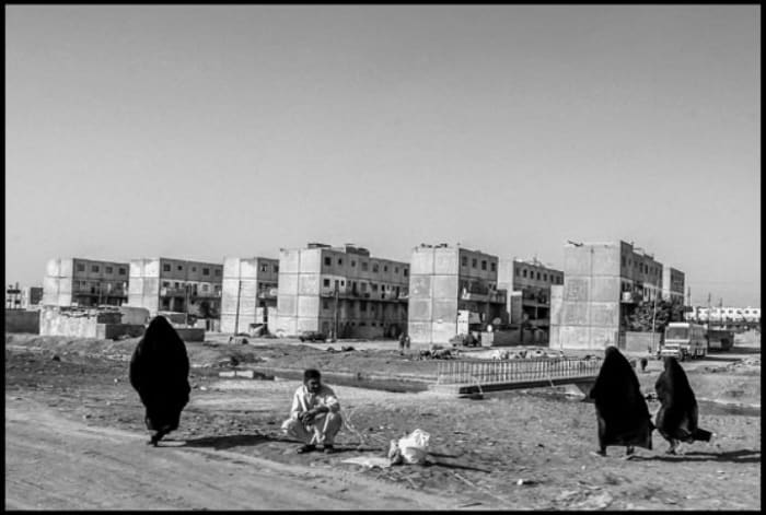 dnbbasra118.jpg BASRA, IRAQ - 26MAY05 - Apartment buildings built by the government for working class residents of Basra.Copyright David Bacon
