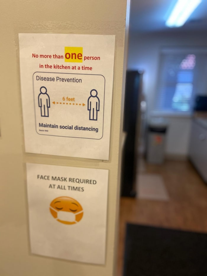 A sign posted in the Hathaway-Sycamores residential treatment facility advising youth and staff to maintain safe practices during the pandemic. Photo courtesy of Joe Ford.