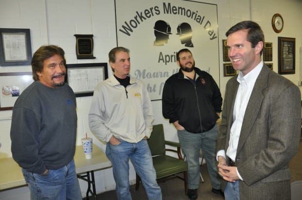 Governor-Elect Andy Beshear talking to union members, from left, Jim Key, Barry Davis and Alton Cunningham III