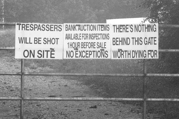 No trespassing signs at an auction storage site in Putnam County, Tennessee in 2011 (Photo by Brian Stansberry via Flickr)