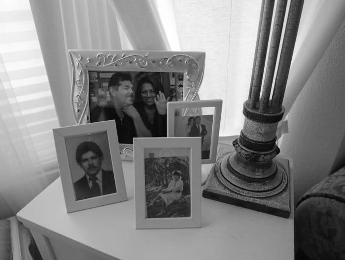 Leonor’s home is surrounded by family pictures of her daughters, grandchildren and Hugo. July 12, 2022. Photo by Zaydee Sanchez for palabra.