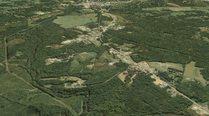 The detention center in Farmville, Virginia, opened on the outskirts of town, between a scrap metal yard and a water treatment plant. The town center, at the top of the image, is about three miles away. Animation by Ajay Limaye using images in Google Earth from 2006 to 2019.