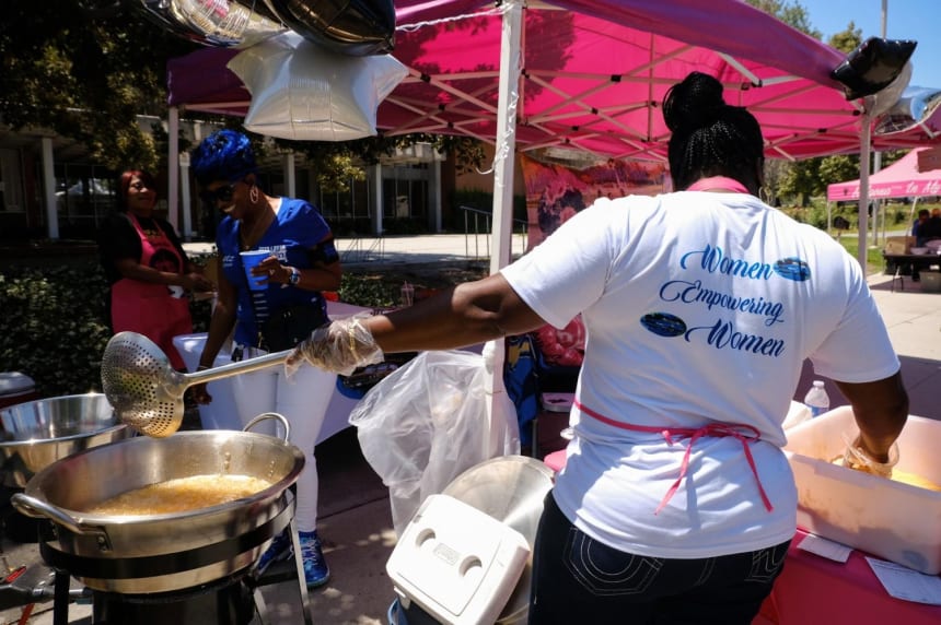 Women lowrider car clubs in San Pedro often get together to fundraise for social issues or feed persons experiencing homelessness. Photo by Zaydee Sanchez for palabra.
