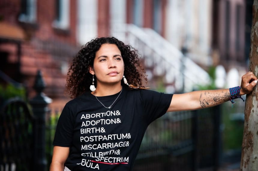 Full spectrum doula Anabel Rivera works at Ancient Song Doula Services in Bedford–Stuyvesant in Brooklyn. The organization supports families in the community with any type of pregnancy loss, including abortion, and miscarriage, and also offers birth, postpartum, and antepartum care. That includes families who need guidance with IVF (in vitro fertilization) and adoption. Photo by Mariela Murdocco for palabra