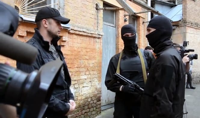 Andriy Beletsky, commanding officer of the special Ukrainian neo-Nazi police regiment Azov, with volunteers in 2014. (My News24, CC BY 3.0, Wikimedia Commons)