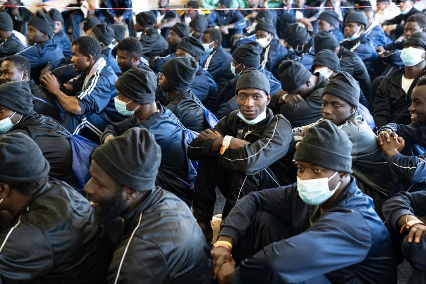 Survivors aboard the Geo Barents line up each day for a deck inspection and food distribution. May 16, 2022. Photo by Lexie Harrison-Cripps for palabra
