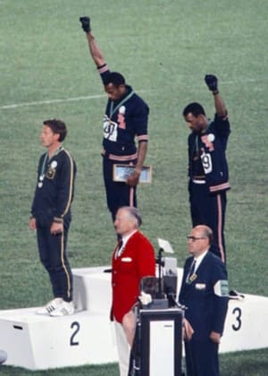Mexico City, 1968: Tommie Smith (center) and John Carlos (right). Photo: Angelo Cozzi/Mondadori Publishers
