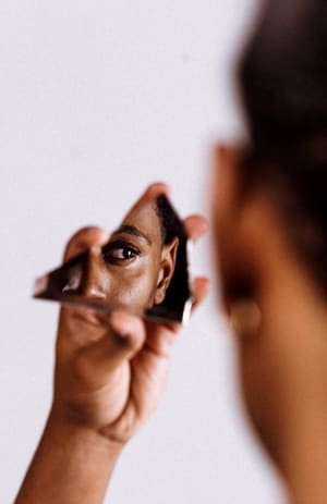 Black Man Photo by jurien huggins on Unsplash