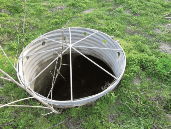 One of the illegal drains - demonstrating how the rainwater would enter the structure and be sent out to sea - instead of nourishing the wetlands. (Photo by Jonathan Coffin)