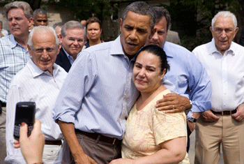 President Barack Obama comforts a resident in a neighborhood hit with flooding from Hurricane Irene in Wayne, N.J., Sept. 4, 2011. (Official White House Photo by Pete Souza)