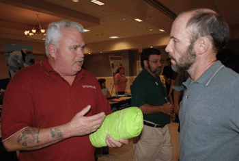 Glenn Murray trying to explain ROC Boom to Kurt A. Hansen, P.E., of the U.S. Coast Guard "Acquisition Directorate"