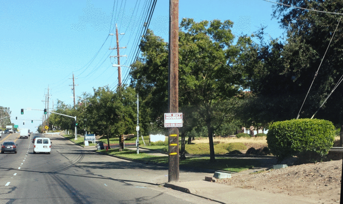 Note the lack of sidewalks connecting this "bus stop" to nearby residences.